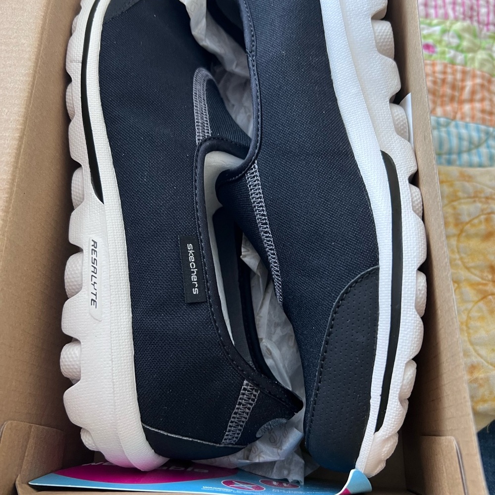 Skechers Black and White Women's Slip-On Sneakers